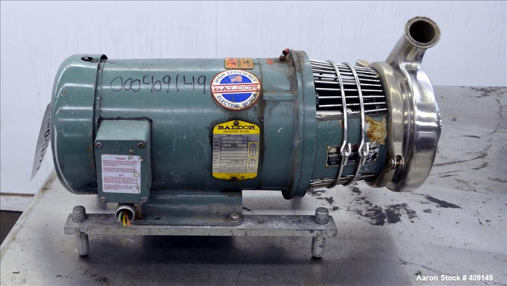Used Tri-Clover Centrifugal Pump, Model C216MDG18T-S, 316 Stainless Steel. Approximate 80 gallons per minute at 100' head. 2" Tri-clamp inlet, 1-1/2" tri-clamp outlet. Driven by a 5hp, 3/60/208-230/4...