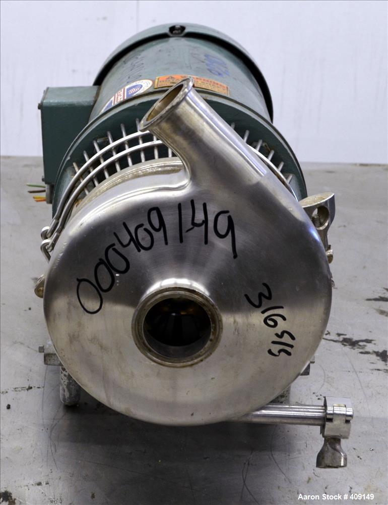Used Tri-Clover Centrifugal Pump, Model C216MDG18T-S, 316 Stainless Steel. Approximate 80 gallons per minute at 100' head. 2" Tri-clamp inlet, 1-1/2" tri-clamp outlet. Driven by a 5hp, 3/60/208-230/4...