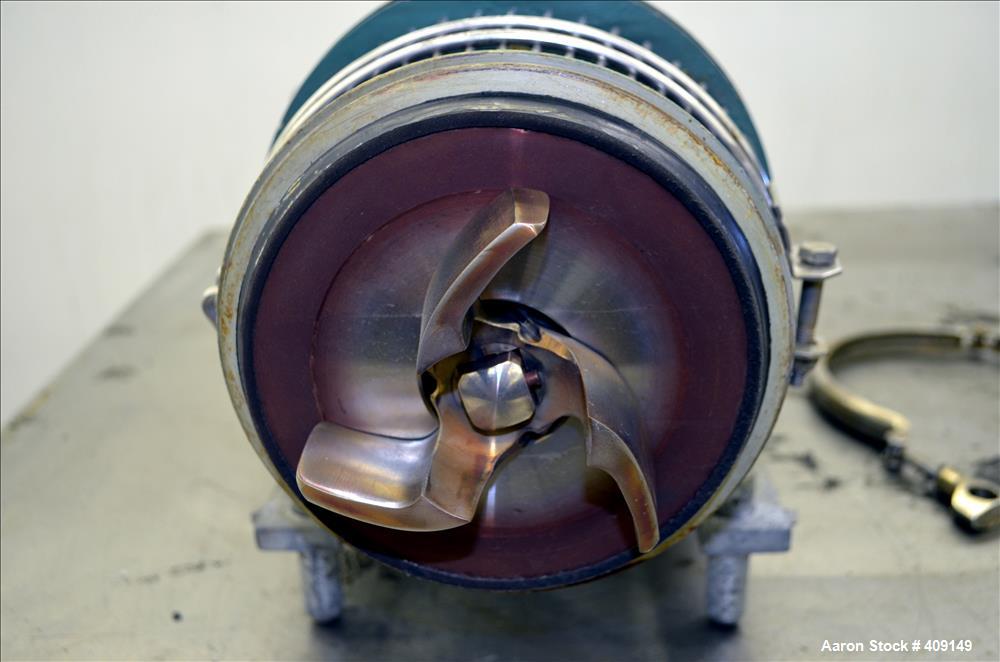 Used Tri-Clover Centrifugal Pump, Model C216MDG18T-S, 316 Stainless Steel. Approximate 80 gallons per minute at 100' head. 2" Tri-clamp inlet, 1-1/2" tri-clamp outlet. Driven by a 5hp, 3/60/208-230/4...