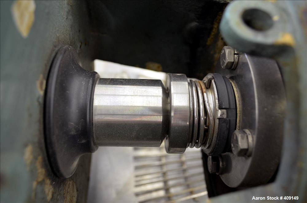 Used Tri-Clover Centrifugal Pump, Model C216MDG18T-S, 316 Stainless Steel. Approximate 80 gallons per minute at 100' head. 2" Tri-clamp inlet, 1-1/2" tri-clamp outlet. Driven by a 5hp, 3/60/208-230/4...