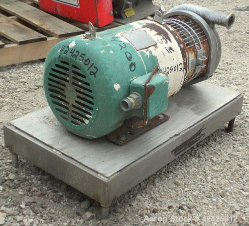 Used Tri-Clover Centrifugal Pump, Model C218MDG21T-20ND-O2U-09SP, 316 Stainless Steel. 2" Sanitary inlet, 1-1/2" sanitary outlet. Approximate 6 3/4" diameter impeller. Rated approximately 180 gallons...