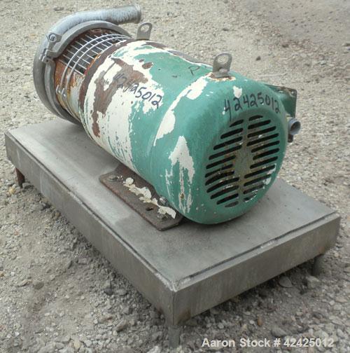 Used Tri-Clover Centrifugal Pump, Model C218MDG21T-20ND-O2U-09SP, 316 Stainless Steel. 2" Sanitary inlet, 1-1/2" sanitary outlet. Approximate 6 3/4" diameter impeller. Rated approximately 180 gallons...