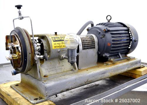 Used Tri-Clover Centrifugal Pump, Model SP218M-9237-40, 316 Stainless Steel. Unit missing front cover. Driven by a 10 hp, 3/60/460 volt, 3510 rpm motor. Mounted on a carbon steel base.