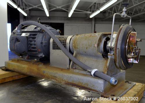 Used Tri-Clover Centrifugal Pump, Model SP218M-9237-40, 316 Stainless Steel. Unit missing front cover. Driven by a 10 hp, 3/60/460 volt, 3510 rpm motor. Mounted on a carbon steel base.