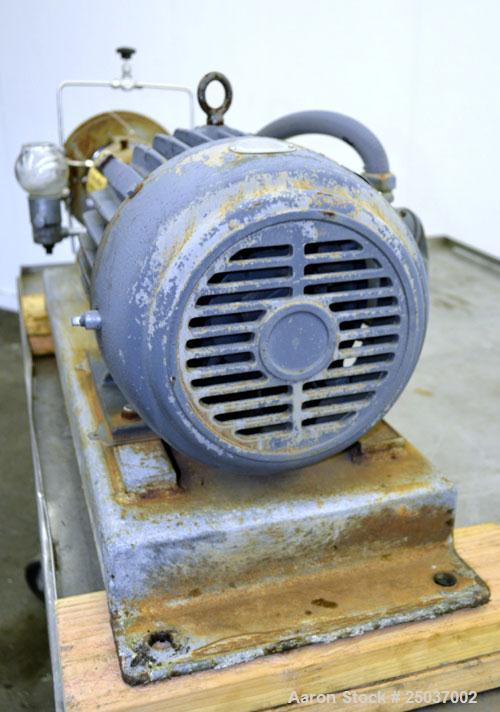 Used Tri-Clover Centrifugal Pump, Model SP218M-9237-40, 316 Stainless Steel. Unit missing front cover. Driven by a 10 hp, 3/60/460 volt, 3510 rpm motor. Mounted on a carbon steel base.