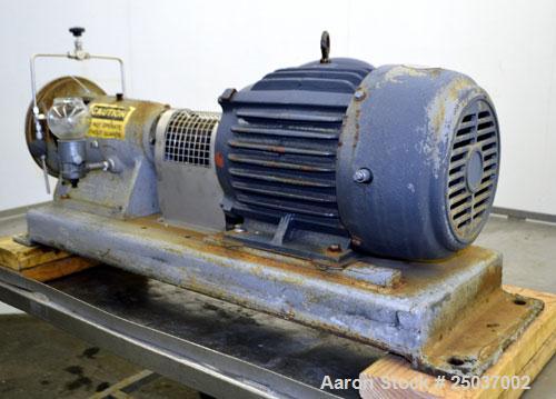 Used Tri-Clover Centrifugal Pump, Model SP218M-9237-40, 316 Stainless Steel. Unit missing front cover. Driven by a 10 hp, 3/60/460 volt, 3510 rpm motor. Mounted on a carbon steel base.