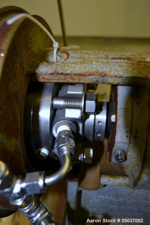 Used Tri-Clover Centrifugal Pump, Model SP218M-9237-40, 316 Stainless Steel. Unit missing front cover. Driven by a 10 hp, 3/60/460 volt, 3510 rpm motor. Mounted on a carbon steel base.