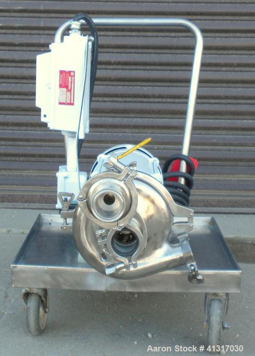 Used Waukesha Centrifugal Pump, Model 2065, 316 Stainless Steel. Rated maximum 400 gallons per minute at 35 feet head. Approximate 6" diameter impeller. 2" tri-clamp inlet/outlet. Driven by a 7 1/2 h...