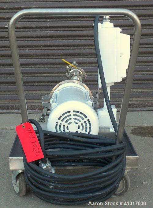 Used Waukesha Centrifugal Pump, Model 2065, 316 Stainless Steel. Rated maximum 400 gallons per minute at 35 feet head. Approximate 6" diameter impeller. 2" tri-clamp inlet/outlet. Driven by a 7 1/2 h...