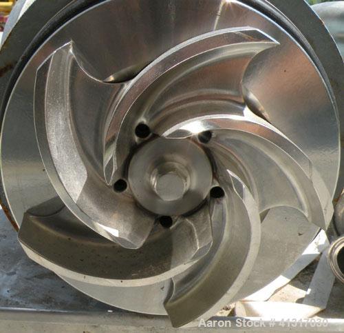 Used Waukesha Centrifugal Pump, Model 2065, 316 Stainless Steel. Rated maximum 400 gallons per minute at 35 feet head. Approximate 6" diameter impeller. 2" tri-clamp inlet/outlet. Driven by a 7 1/2 h...