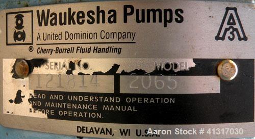 Used Waukesha Centrifugal Pump, Model 2065, 316 Stainless Steel. Rated maximum 400 gallons per minute at 35 feet head. Approximate 6" diameter impeller. 2" tri-clamp inlet/outlet. Driven by a 7 1/2 h...
