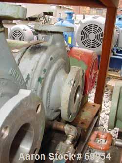 Used Worthington Centrifugal Pump, Model D1011. Size 3" inlet x 1-1/2" outlet x 8" diameter impeller, 316 stainless steel. Rated 275 psi at 100 deg F. Direct connected to a 5 hp, 3/60/230/460 volt, 1...