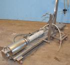 Used- Piston Transfer Pump, Stainless Steel. Mounted on stainless steel cart.