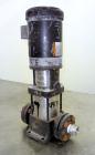 Used Grundfos CR2 Vertical Multistage Centrifugal Pump, Model CR2-80UGUAAUUE, 316 Stainless Steel. Approximate 11 gallons per minute at 290' head at 3450 rpm at 300 psi. 2