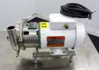 Used Tri-Clover Tri-Flo H.D. Series Centrifugal Pump, Model C215MDG56T-S, 316 Stainless Steel.  Approximate capacity 60 gallons per minute.  2” Tri-clamp inlet, 1-1/2” tri-clamp outlet.  Driven by a ...