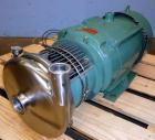 Used Tri-Clover Centrifugal Pump, Model C216MD25T-S-KX, Stainless Steel. 2’’ Tri-clamp inlet, 1-1/2’’ tri-clamp outlet.Approximate capacity 220 gallons per minute at 110’ head.Driven by a 15 hp, 3/60...