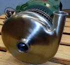 Used Tri-Clover Centrifugal Pump, Model C216MD25T-S-KX, Stainless Steel. 2’’ Tri-clamp inlet, 1-1/2’’ tri-clamp outlet.Approximate capacity 220 gallons per minute at 110’ head.Driven by a 15 hp, 3/60...