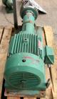 Used Tri-Clover Tri-Flo Centrifugal Pump, model SP218MH-S, 316 stainless steel. 2’’ tri-clamp inlet, 1-1/2’’ tri-clamp outlet. Approximate capacity 180 gallons per minute at 210' head, 7-1/4