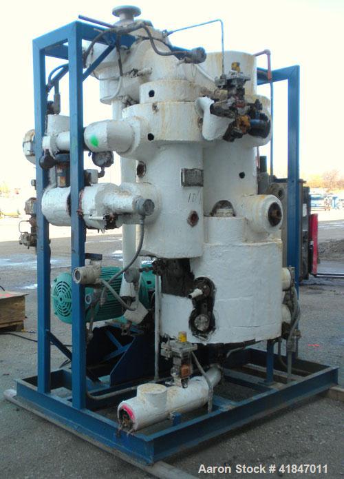 Used Apovac Vacuum System consisting of: (1) Vacuum pump, driven by a 30 hp motor. (1) Industrial Piping heat exchanger, (1) Industrial Piping pressure tank, and a control panel. Mounted on a carbon ...