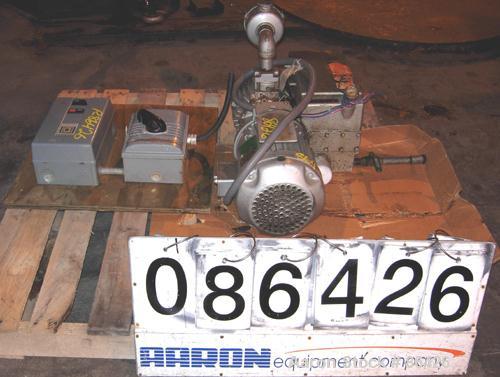 USED: Busch single stage, oil sealed, rotary vane vacuum pump, model R5-063-138, carbon steel. Rated 41 cfm (29.3 hg), 15 torr. Air cooled. 1-1/4" NPT inlet/outlet. Driven by a 3 hp, 3/60/208-230/460...