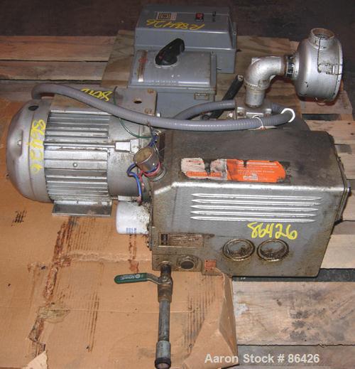 USED: Busch single stage, oil sealed, rotary vane vacuum pump, model R5-063-138, carbon steel. Rated 41 cfm (29.3 hg), 15 torr. Air cooled. 1-1/4" NPT inlet/outlet. Driven by a 3 hp, 3/60/208-230/460...