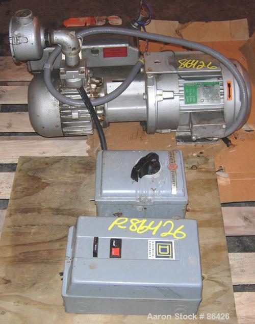 USED: Busch single stage, oil sealed, rotary vane vacuum pump, model R5-063-138, carbon steel. Rated 41 cfm (29.3 hg), 15 torr. Air cooled. 1-1/4" NPT inlet/outlet. Driven by a 3 hp, 3/60/208-230/460...