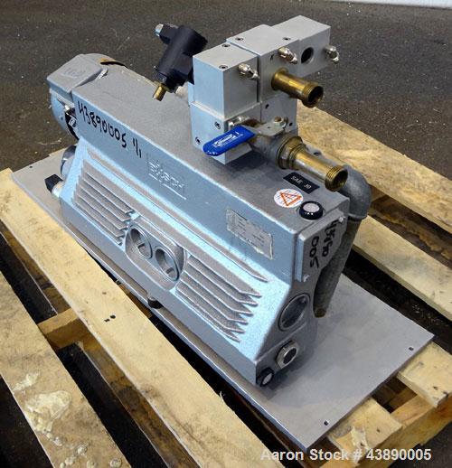 Used Busch Series R5 Single Stage, Oil Sealed, Rotary Vane Vacuum Pump, Model 0100-131, Carbon Steel. Rated 63 cfm, air cooled. Driven by a 3 kw, 220/240 volt, 1440 rpm motor. Base mounted.