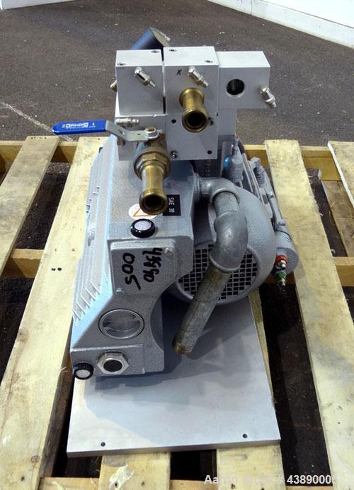 Used Busch Series R5 Single Stage, Oil Sealed, Rotary Vane Vacuum Pump, Model 0100-131, Carbon Steel. Rated 63 cfm, air cooled. Driven by a 3 kw, 220/240 volt, 1440 rpm motor. Base mounted.