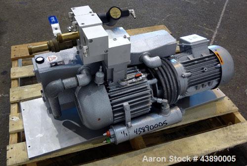 Used Busch Series R5 Single Stage, Oil Sealed, Rotary Vane Vacuum Pump, Model 0100-131, Carbon Steel. Rated 63 cfm, air cooled. Driven by a 3 kw, 220/240 volt, 1440 rpm motor. Base mounted.