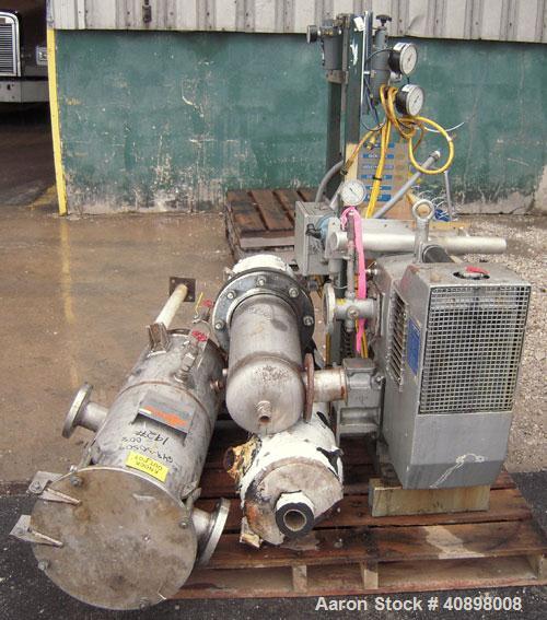 Used Busch Huckepack Two Stage Rotary Vane Vacuum Pump, Model 433:013. Rated 200 cfm at .5 Torr, with a 15 hp, 3/60/460 volt, 1765 rpm XP motor, knock out pot, receiver and heat exchanger. Serial #50...