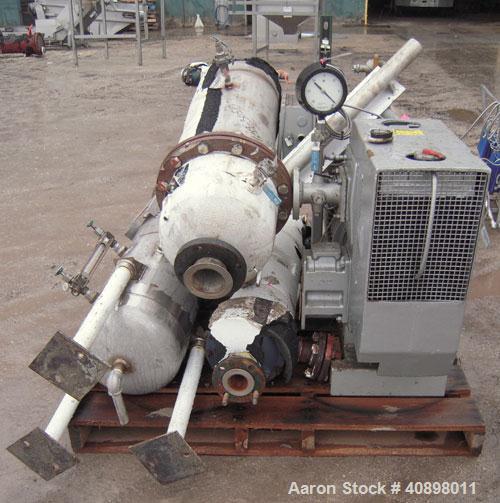 Used Busch Huckepack Two Stage Rotary Vane Vacuum Pump, Model 433:014. Rated 176 cfm at .5 Torr, with a 15 hp, 3/60/460 volt, 1765 rpm XP motor, knock out pot, receiver and heat exchanger. Serial #25...