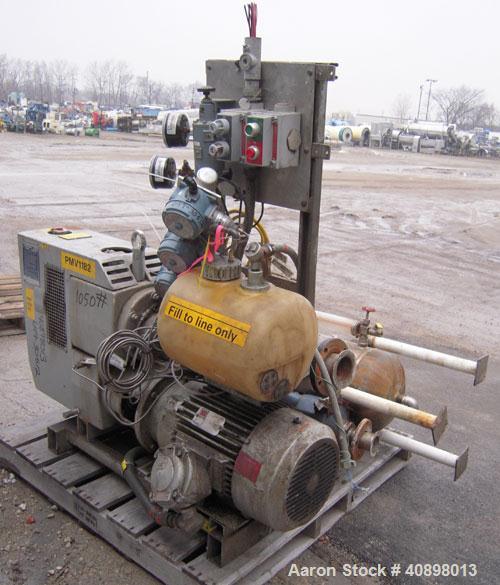 Used Busch Huckepack Two Stage Rotary Vane Vacuum Pump, Model 433:014. Rated 176 cfm at .5 Torr, with a 15 hp, 3/60/460 volt, 1765 rpm XP motor, knock out pot, receiver and heat exchanger. Serial #25...