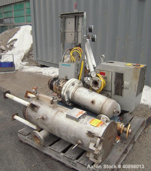 Used Busch Huckepack Two Stage Rotary Vane Vacuum Pump, Model 433:014. Rated 176 cfm at .5 Torr, with a 15 hp, 3/60/460 volt, 1765 rpm XP motor, knock out pot, receiver and heat exchanger. Serial #25...