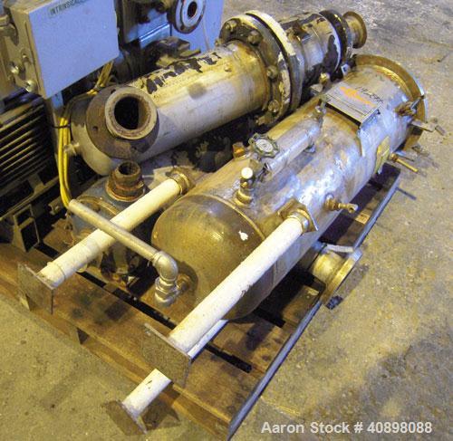 Used Busch Huckepack Two Stage Rotary Vane Vacuum Pump, Model 433:014. Rated 176 cfm at .5 Torr, with a 15 hp, 460 volt motor, knock out pot, receiver and heat exchanger. Serial #25111