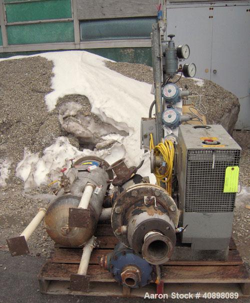 Used Busch Huckepack Two Stage Rotary Vane Vacuum Pump, Model 433:014. Rated 176 cfm at .5 Torr, with a 15 hp, 3/60/460 volt, 1765 rpm motor, knock out pot, receiver and heat exchanger. Serial #25084