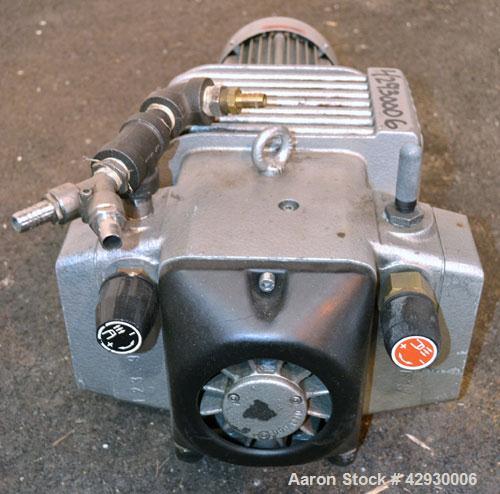 Used Busch Dry Running Rotary Vane Vacuum Pump, Model DC0040B003LCXX, Carbon Steel. Approximate  28 CFM. Driven y a 2.2 kw (3hp), 3/60/230/460 volt, 1704 rpm motor.