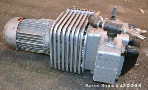 Used Busch Dry Running Rotary Vane Vacuum Pump, Model DC0040B003LCXX, Carbon Steel. Approximate  28 CFM. Driven y a 2.2 kw (3hp), 3/60/230/460 volt, 1704 rpm motor.