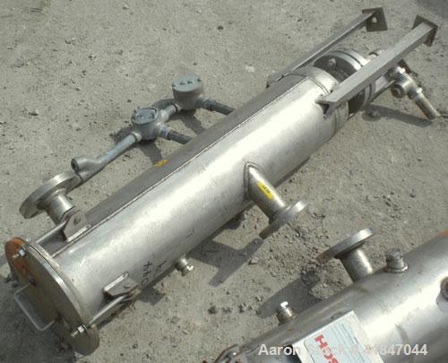 Used Busch Single Stage Cobra Dry Screw Vacuum Pump, model NC0070ABM6.000F, carbon steel. Rated 58 cfm, 0.075’’ Torr., air cooled. Driven by a 5 hp, 3/20-60/460 volt, 3505 rpm XP motor. Includes an X...