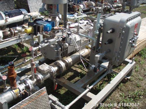 Used Busch Single Stage Cobra Dry Screw Vacuum Pump, Model NC0070ABM6.000F, Carbon Steel. Rated 58 cfm, 0.075’’ Torr., air cooled. Driven by a 5 hp, 3/20-60/460 volt, 3505 rpm XP motor. Includes an X...