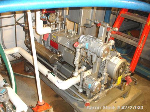 Used Busch Single Stage Cobra Dry Screw Vacuum Pump, Model NC0070, Carbon Steel. Rated 50 cfm at .075 torr, jacketed chamber with heat exchanger and silencer, direct coupled 5 hp, 230/460 volt xp mot...