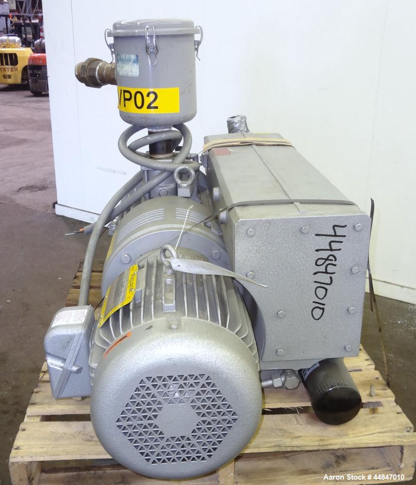 Used Busch R5 Single Stage Oil Sealed Rotary Vane Vacuum Pump, Model RA0255.D506.1001, Carbon Steel.  Rated 180 cfm, vacuum 0.5 Torr.  Driven by a 10 hp, 3/60/230/460 volt, 1760 rpm motor.