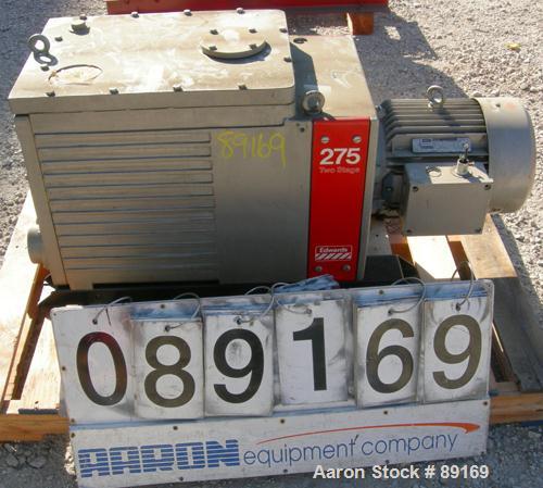 Used Edwards Two Stage Rotary Vane Vacuum Pump, Model E2M275, Carbon Steel. Rated 172 cfm. Driven by a 6 kW (7.5 hp), 3/60/230/460 volt, 1150 rpm motor.
