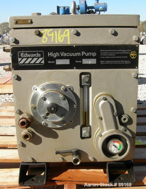 Used Edwards Two Stage Rotary Vane Vacuum Pump, Model E2M275, Carbon Steel. Rated 172 cfm. Driven by a 6 kW (7.5 hp), 3/60/230/460 volt, 1150 rpm motor.