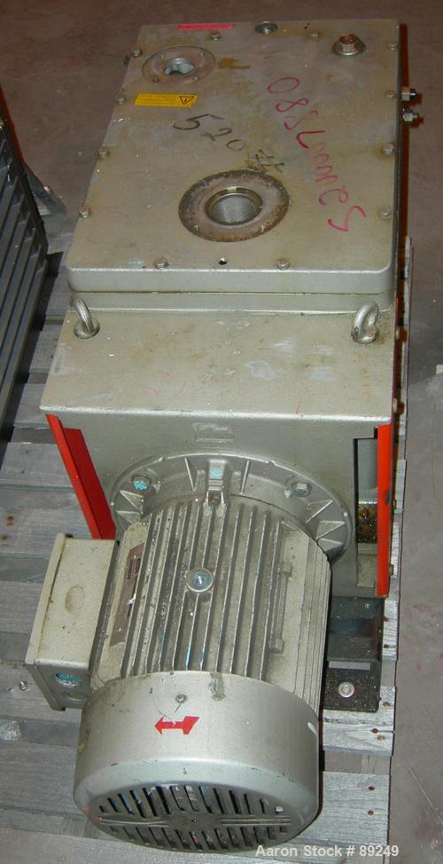 Used Edwards Two Stage Rotary Vane Vacuum Pump, Model E2M275, Carbon Steel. Rated 172 cfm. Driven by an 8.5 kW (10 hp), 3/60/230/460 volt, 1730 rpm motor.