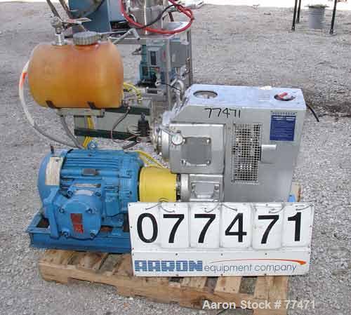 USED:Busch Huckepack once-through-sealing vacuum pump, rotary vane,type 433:014, rated 200 cfm. Driven by a 20 hp 3/60/230/460 volt  745 rpm XP motor. Skid mounted.
