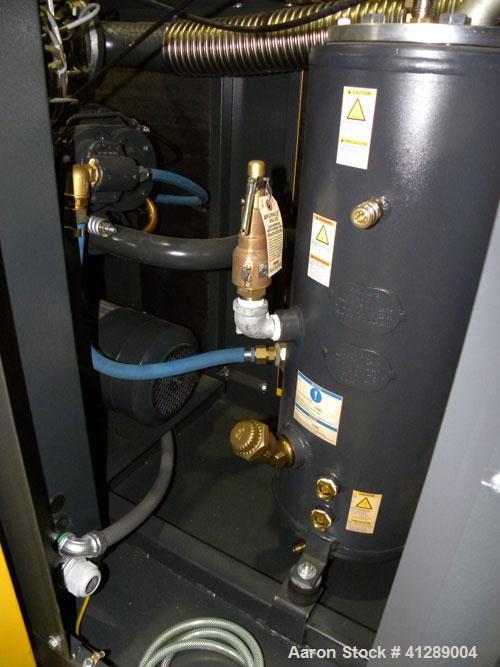 Used Kaeser Rotary Screw Vacuum Package, Model ASV 40. Rated 168 ACFM at 10" HGV. Air cooled. Driven by a 7.5 kw (10 hp), 3/60/230/460 volt, 3535 rpm motor. Includes a Sigma control system. Built 200...