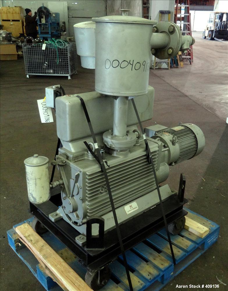 Used Leybold-Heraeus Two Stage Rotary Piston Vacuum Pump, 117.8 CFM, Model DK200, Carbon Steel. Driven by a 7.5hp, 3/60/230/460 volt, 1755 rpm motor. Mounted on a base with casters. Serial# 895031179...