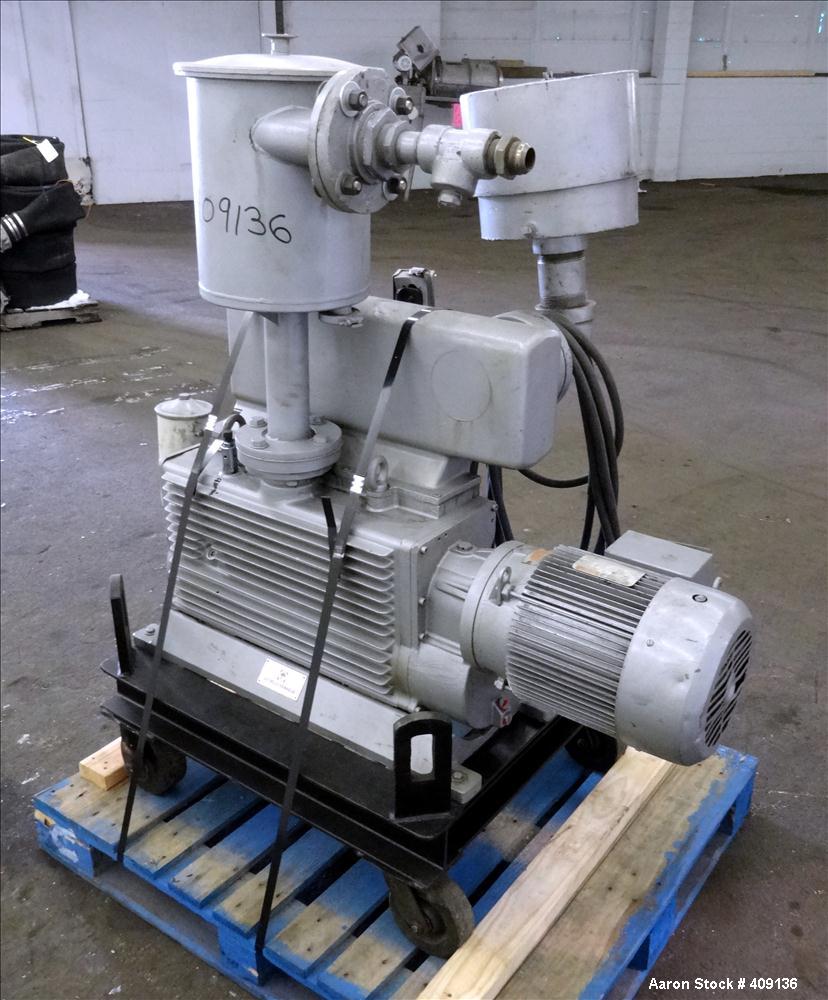 Used Leybold-Heraeus Two Stage Rotary Piston Vacuum Pump, 117.8 CFM, Model DK200, Carbon Steel. Driven by a 7.5hp, 3/60/230/460 volt, 1755 rpm motor. Mounted on a base with casters. Serial# 895031179...