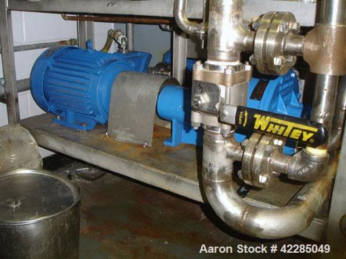 Used Nash Liquid Ring Vacuum Pump, model AHF-120, stainless steel. Rated 120 cfm. Driven by a 7.5 hp XP motor. Mounted on a base. Price includes 15% buyer's premium. Not available until July 2010.
