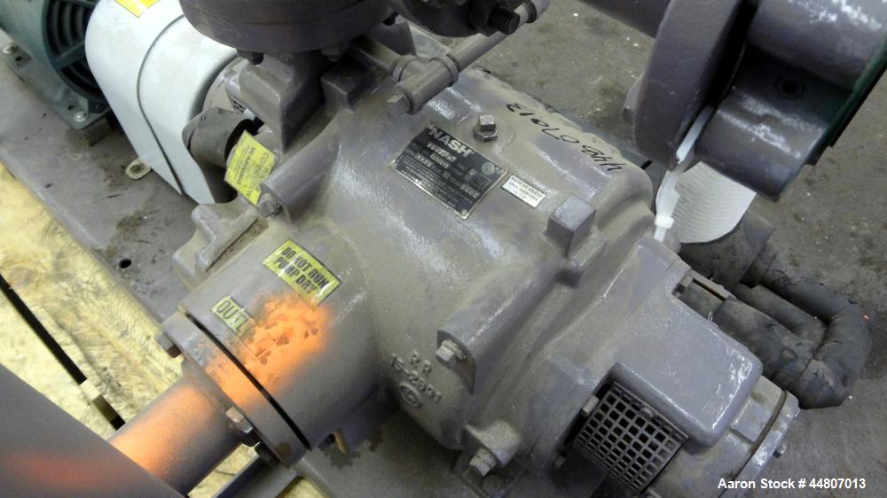 Used Nash Liquid Ring Vacuum Pump, Size SC4/7, Carbon Steel.  Flow rate of 10 gallons per minute 25 to 28" Hg vacuum, approximately 300 cfm.  Driven by a 20 hp, 3/60/230/460 volt, 1175 rpm motor. Inc...